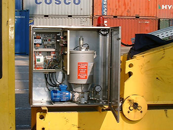 Sistema de lubricació centralizada per a grua portuària